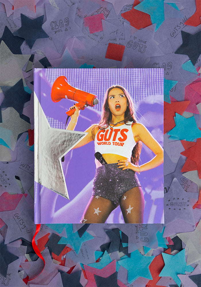 GUTS world tour book front cover