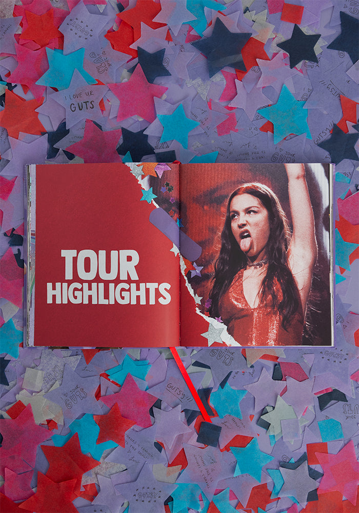 GUTS world tour book open